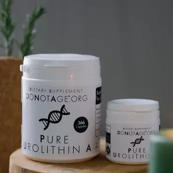 DoNotAge.org Urolithin A anti-ageing supplements on a wooden surface.
